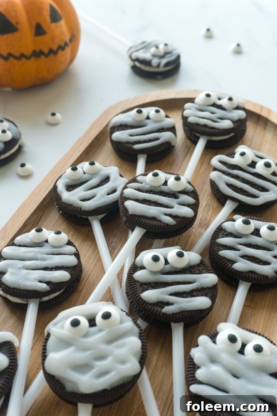 A festive display of Halloween Mummy Oreo Pops, showcasing their simple charm.