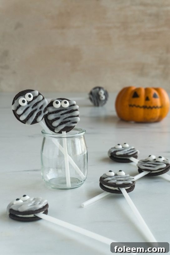 Completed Halloween Mummy Oreo Pops arranged neatly, ready to be served.