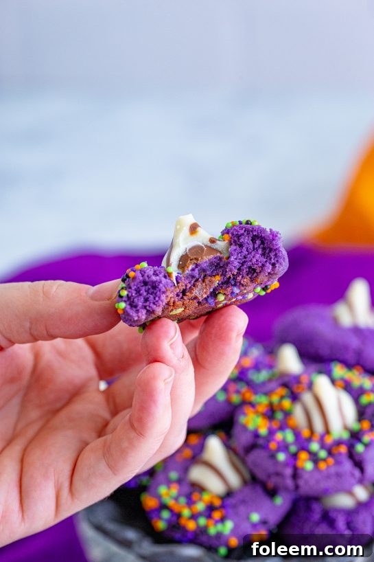 A festive arrangement of Halloween Witch Hat Cookies for any fall or Halloween party.