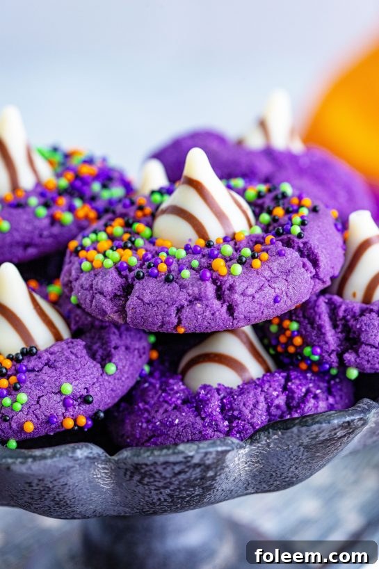 A single easy purple Halloween Witch Hat Cookie, perfect for any spooky fall party.