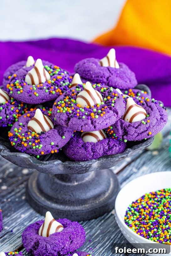 Easy dark purple Halloween Witch Hat Cookies, perfect for spooky fall gatherings.