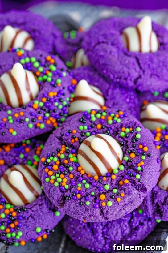 A tray of freshly baked Halloween Witch Hat Cookies, ready for a spooky party.