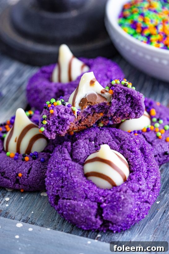 A vibrant display of Halloween Witch Hat Cookies, both spooky and delicious, ideal for family baking.