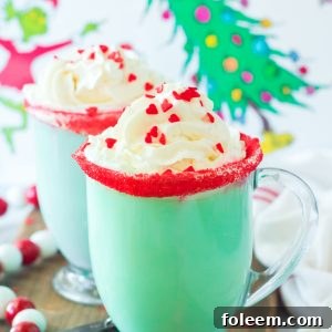 Green Grinch Hot Chocolate recipe is the perfect combination of creamy, smooth hot chocolate and green Grinch fun for Christmas. Kids and adults alike will love it!