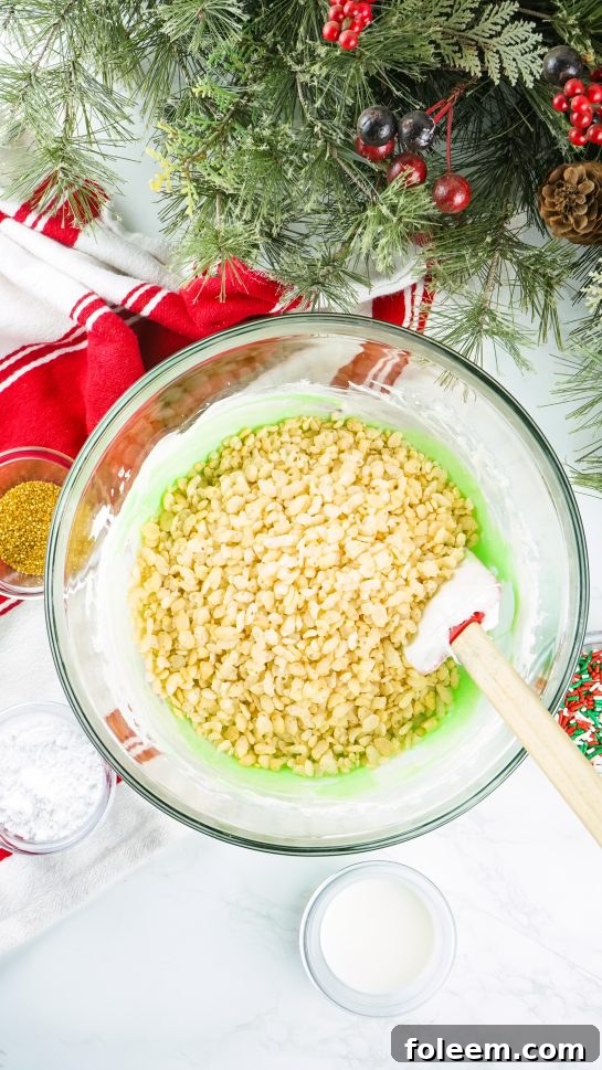 Mixing the marshmallow and cereal for the Wreath Cake
