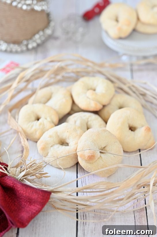 Italian Wine Cookies (Ciambelle al Vino) recipe are a perfect addition to your holiday cookie trays These cookies are light, crunchy, easy to make and made with wine. These are great dipped in coffee or tea!