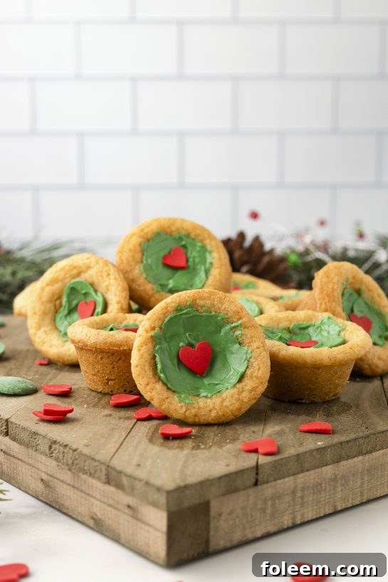 Vibrant green Grinch Cookie Cup Bites, chewy and delicious.