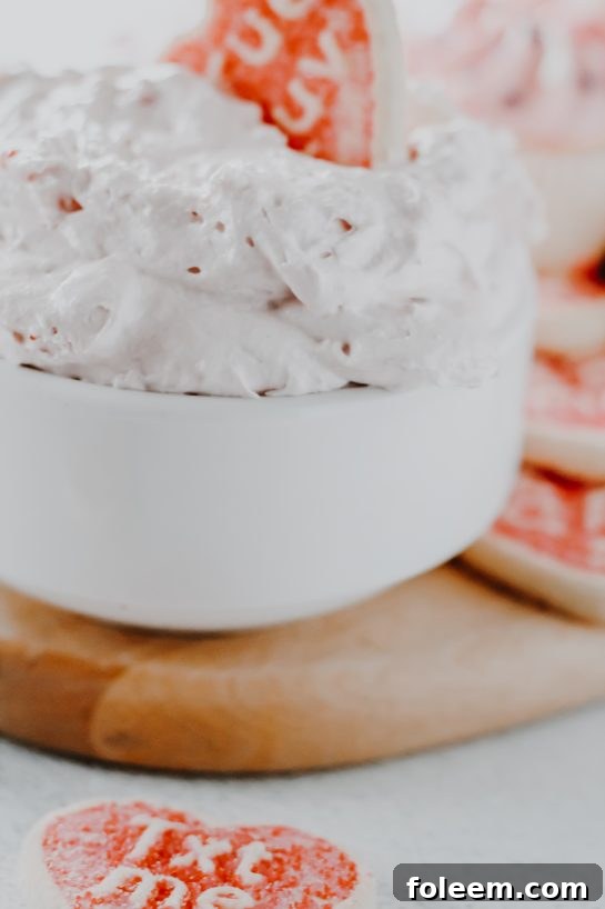 Strawberry Cake Mix Dip served elegantly with an assortment of dippers, showcasing its vibrant appeal for any occasion