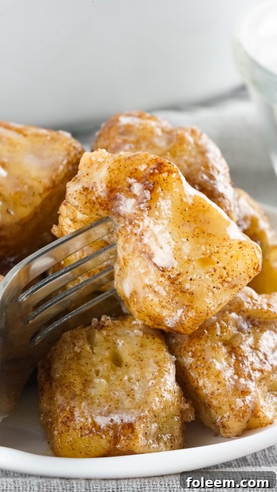 Freshly baked Crock Pot Monkey Bread with sweet glaze, perfect for any occasion.