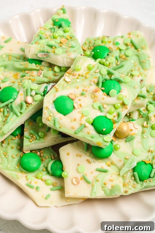 Vibrant Leprechaun Bark candy loaded with colorful and green, festive toppings, perfect for St. Patrick's Day celebrations.