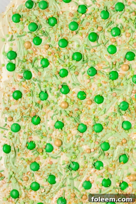 All the vibrant ingredients for Leprechaun Bark gathered in a pan, ready for St. Patrick's Day treat making.