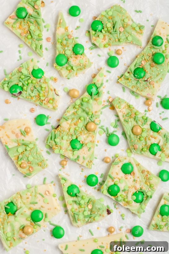 Finished Leprechaun Bark, broken into festive pieces, ready to be enjoyed for St. Patrick's Day.