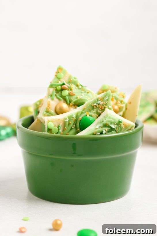 Easy Leprechaun Bark, a delightful candy recipe with colorful and green toppings, perfect for a St. Patrick's Day party.