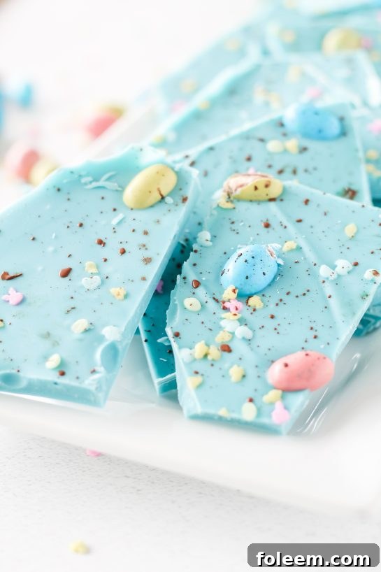 No-Bake Robin Egg Easter Bark is a show-stopping beautiful blue Easter Bark. Super simple and easy to make, topped with chocolate candy eggs is the cutest dessert for Easter!