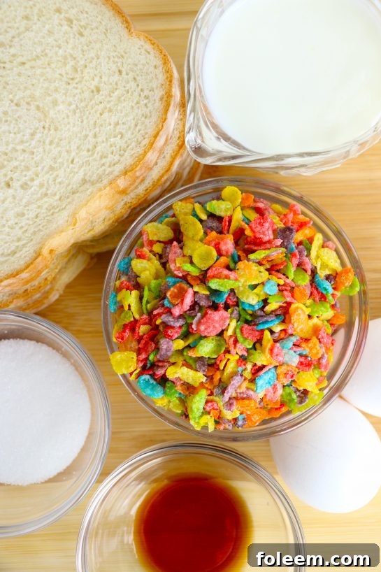Ingredients laid out for making Air Fryer Fruity Pebble French Toast, including bread, milk, eggs, vanilla, sugar, and a bowl of colorful Fruity Pebbles cereal.