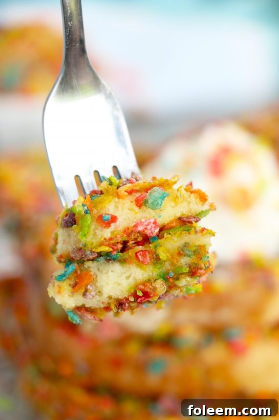A close-up shot of Air Fryer Fruity Pebble French Toast, featuring its vibrant colors and crunchy texture, perfect for a fun and sweet breakfast.