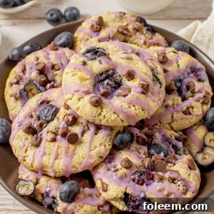 Blueberry Chocolate Chip Cookies are deliciously thick, soft, and chewy cookies that are perfectly spiced and stuffed full of fresh blueberries!