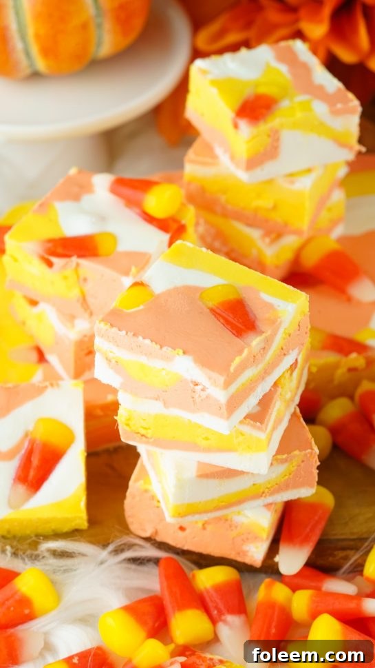 Easy No-Bake Candy Corn Fudge recipe is a delicious and fun Halloween treat for kids and adults. This creamy homemade fudge only needs 4 ingredients and 15 minutes to make!