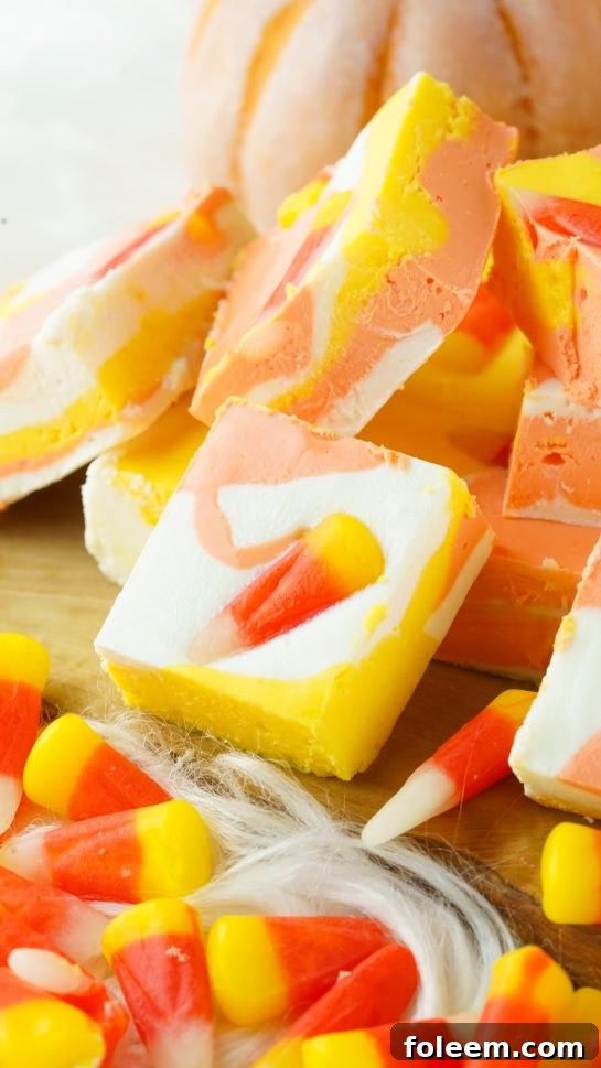 No-Bake Candy Corn Fudge recipe is a delicious and fun Halloween or fall treat for kids and adults. This creamy homemade fudge only needs 4 ingredients and 15 minutes to make!