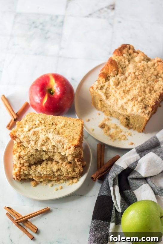 Overhead shot of the Apple Streusel Coffee Cake fall dessert recipe just perfect for Fall! This soft, moist cake is easy to make because it starts with a box mix that you jazz up with apples and a crunchy cinnamon streusel topping. 