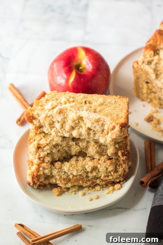 Apple Streusel Coffee Cake fall dessert recipe just perfect for Fall! This soft, moist cake is easy to make because it starts with a box mix that you jazz up with apples and a crunchy cinnamon streusel topping. 