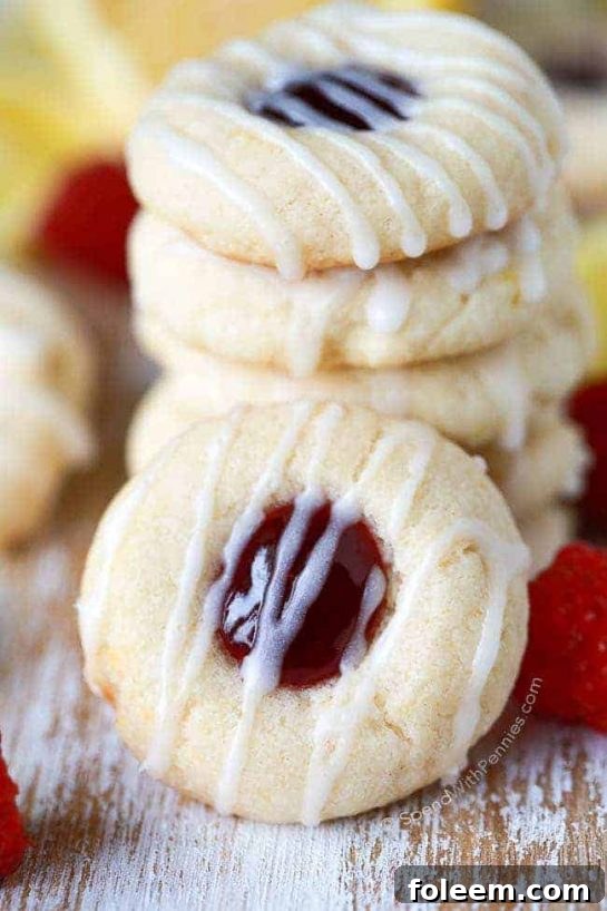 Raspberry Thumbprint Cookies recipe. This raspberry thumbprint cookie recipe turns out perfectly every time for plenty of fruity cookies to go around!