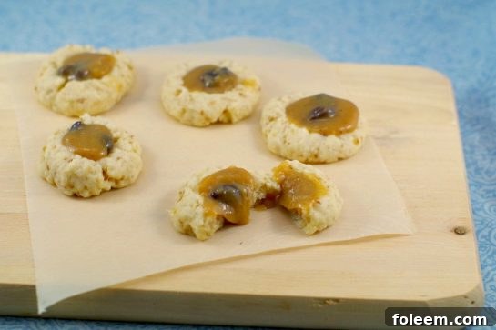 Butter Tart Thumbprints recipe. This recipe for butter tart thumbprints makes for such a decadent way to make cookies!