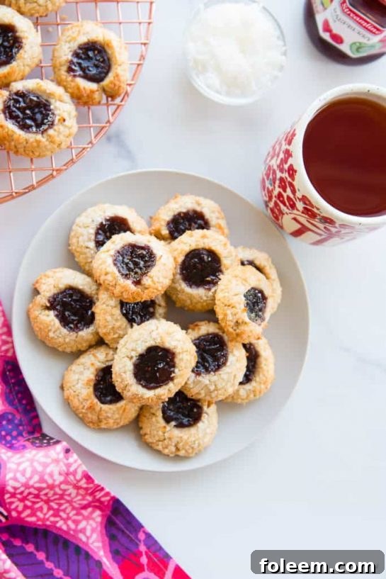 Coconut Raspberry Thumbprint Cookies recipe. Coconut and raspberry complement each other so well in this cookie recipe.