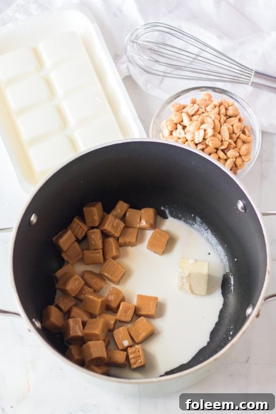 Caramel squares melting in a saucepan, the first step for No-Bake Polar Bear Claws.