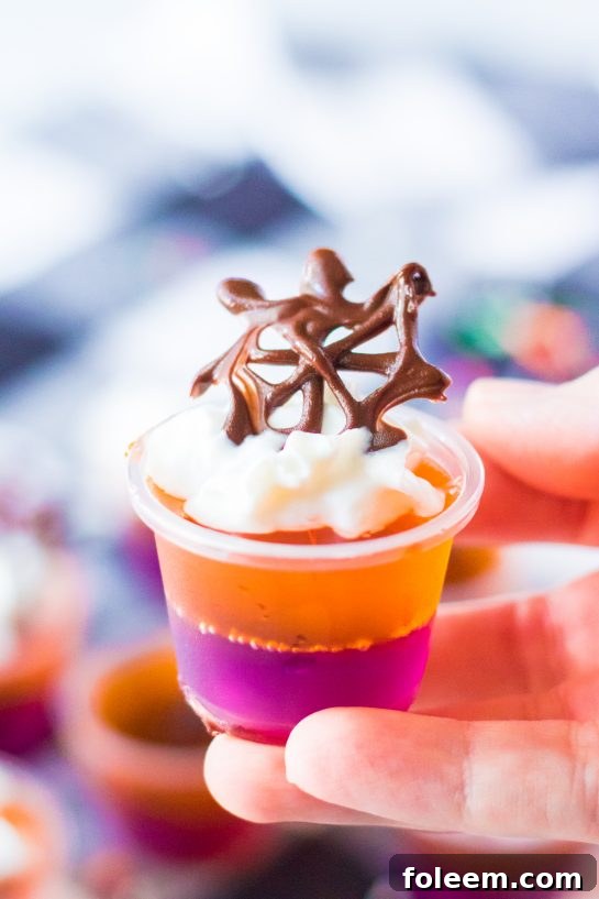 A close-up view of the perfectly set Halloween Jello Shots, ready for a festive Halloween party.