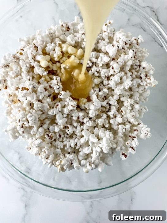 Mixing the ingredients needed to make New Year Champagne Popcorn Balls recipe