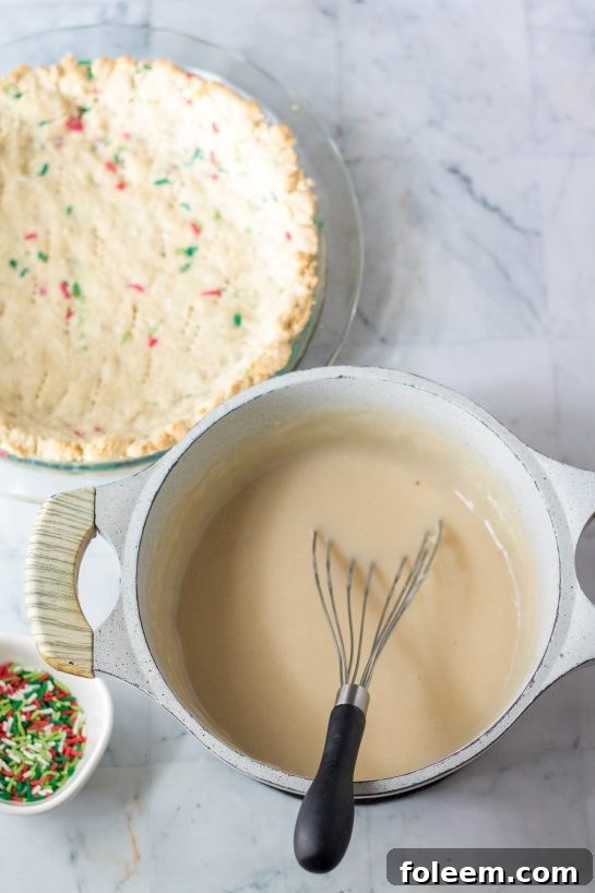 Making the filling for the Christmas Sugar Cream Pie Recipe before pouring into the crust