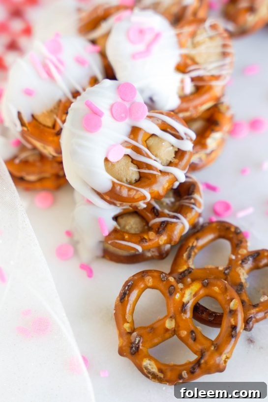 Easy Valentine's Day Pretzel Bites recipe is fun to make for any holiday, with peanut butter filling and white chocolate coating, great for gifts and parties!