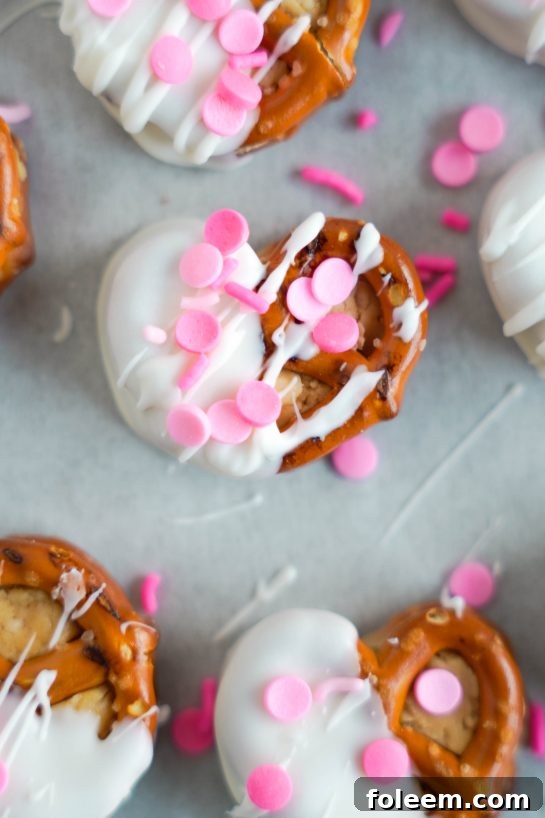 Valentine's Day Pretzel Bites with festive sprinkles added, a perfect sweet and salty treat