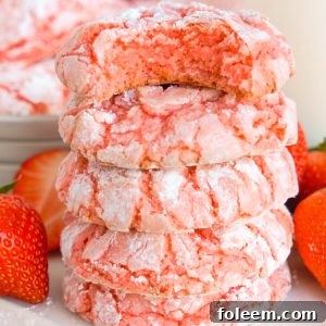 Strawberry Crinkle Cookies: a simple and delicious strawberry cookie recipe made with cake mix. If you're looking for the easiest cookie recipe on the planet, you found it! These cookies require just FIVE ingredients and come out perfectly every time.