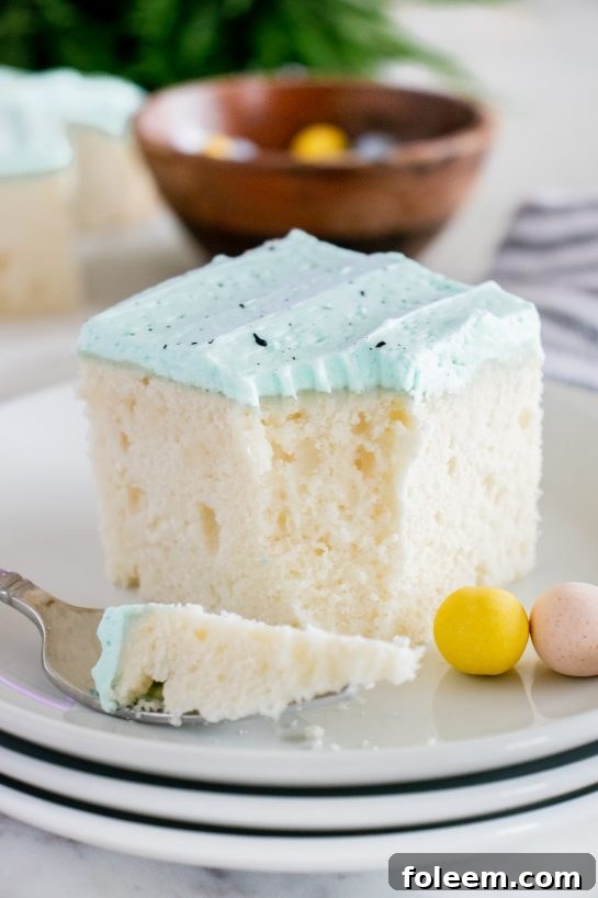 Beautiful blue Easter Speckled Egg Snack Cake adorned with chocolate speckles, perfect for spring dessert