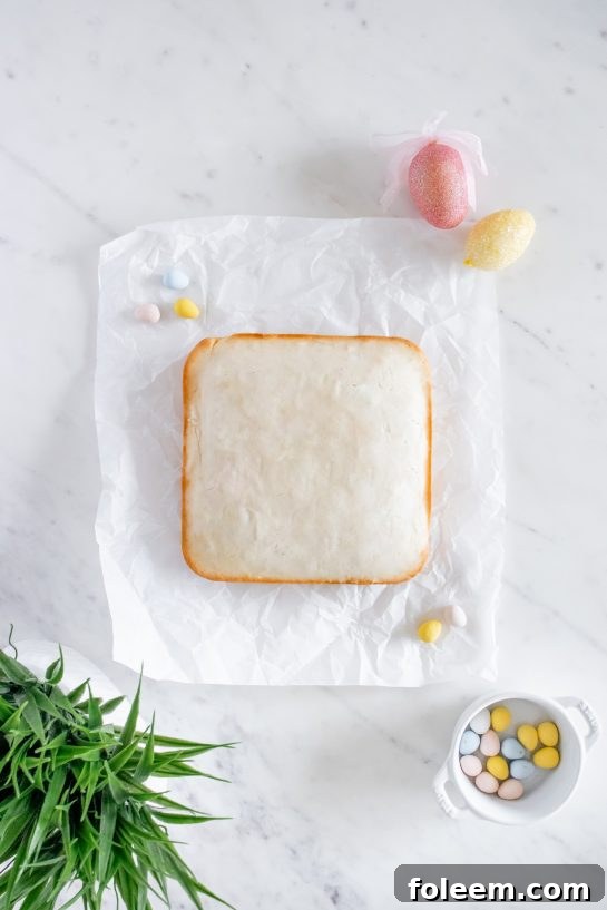 Freshly baked Easter Speckled Egg Snack Cake removed from the oven, ready for frosting