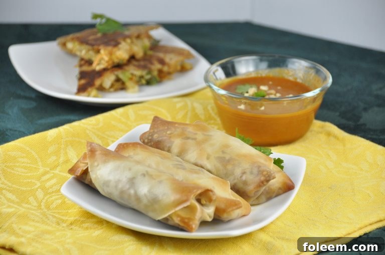 Crispy Baked Pork Spring Rolls recipe with a Thai twist that are perfect to serve for dinner or a party appetizer! They are healthier because they're baked right in the oven!