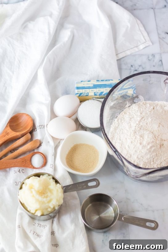 A selection of fresh ingredients laid out for making the fluffy and tender mashed potato rolls recipe.
