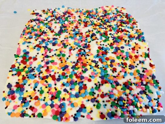 Photo of all the ingredients needed to make sugar Cookie Fudge recipe, mixed and set, for the holidays.