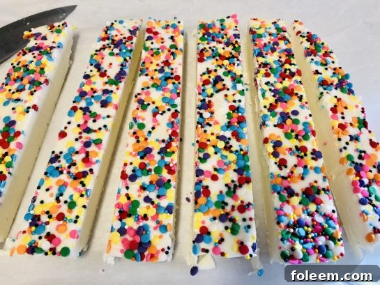 Photo of the finished sugar Cookie Fudge recipe cut into bite-size pieces.