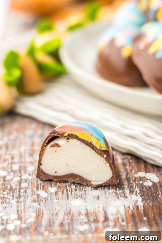 Photo of the completed Easter Marshmallow Eggs cut open and plated to show the insides for Easter dessert.