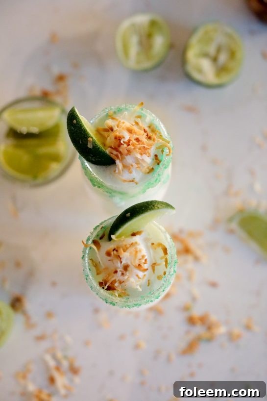 A visual guide to the blending process for Coconut Lime Frozen Margaritas, showcasing the transformation of ingredients into a smooth, icy, and perfectly creamy tropical drink.