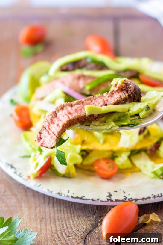 Photo of the sliced and finished Steak Tostada Salad recipe