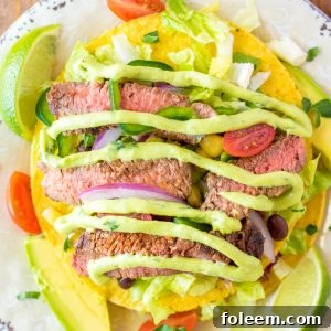 Steak Tostada Salad recipe has a Mexican twist and is the steak salad of your dreams! It's loaded with a juicy steak, your favorite veggies, and a creamy cilantro-lime vinaigrette. It makes a delicious healthy lunch or dinner salad!