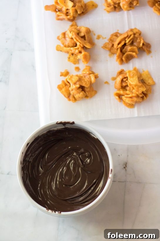 Melting chocolate in a bowl, ready to drizzle over the Frito Candies