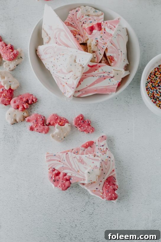 An overhead view of the complete No-Bake Circus Cookie Bark, vibrant with colors and textures, ready to be broken and served.