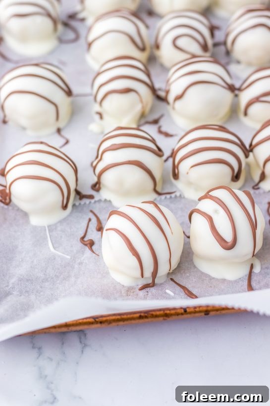 Photo of the Zebra Cake Balls recipe ready to be dipped in the chocolate.