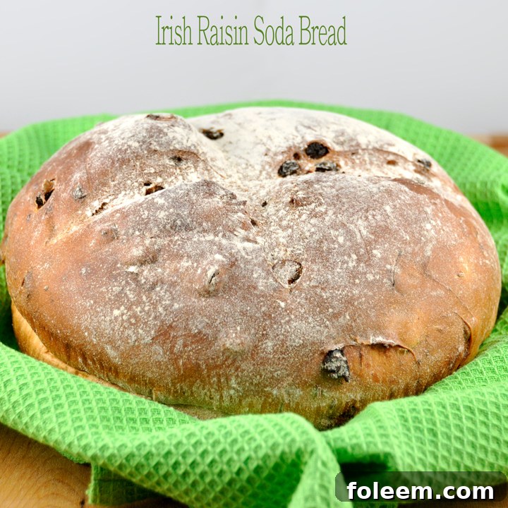 Delicious Irish Raisin Soda Bread, freshly baked and perfect for St. Patrick's Day celebrations. This quick bread recipe tastes like it's from a bakery.