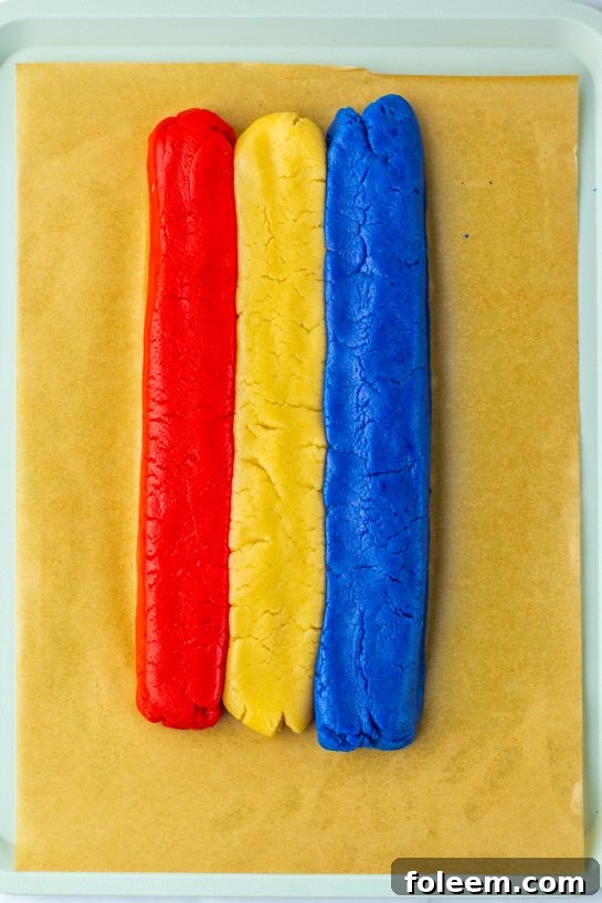 Rolling out the dough to make the Bomb Pop Cookies Recipe for Memorial day or 4th of July